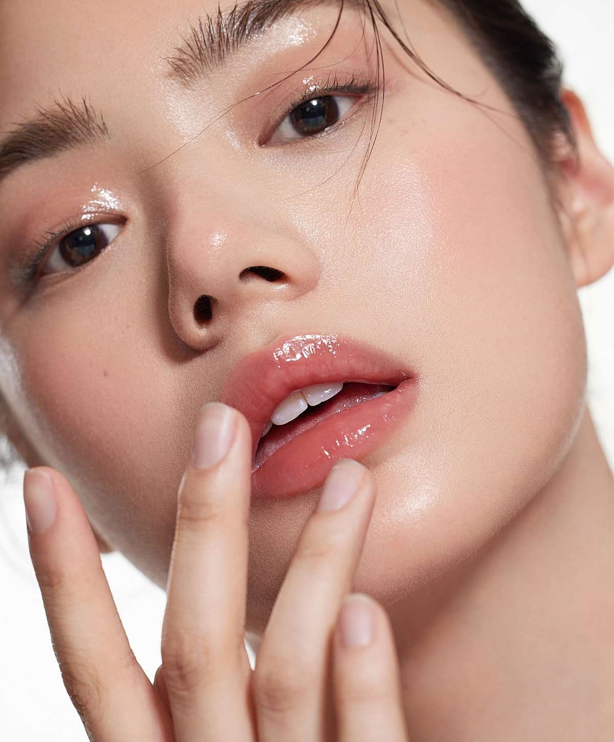 Radiant close-up of a woman's face and lips.