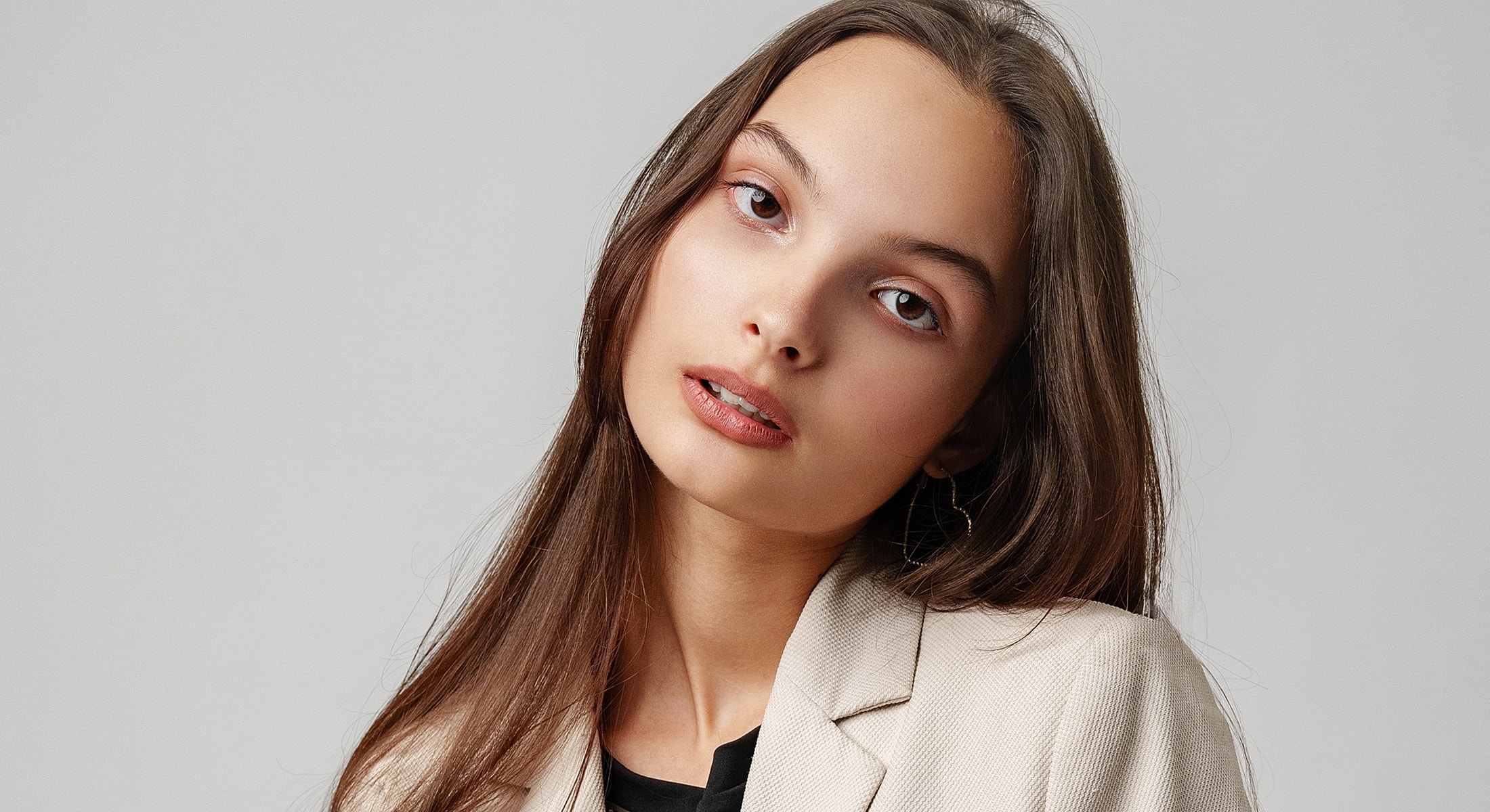 Portrait of a young woman in a blazer.